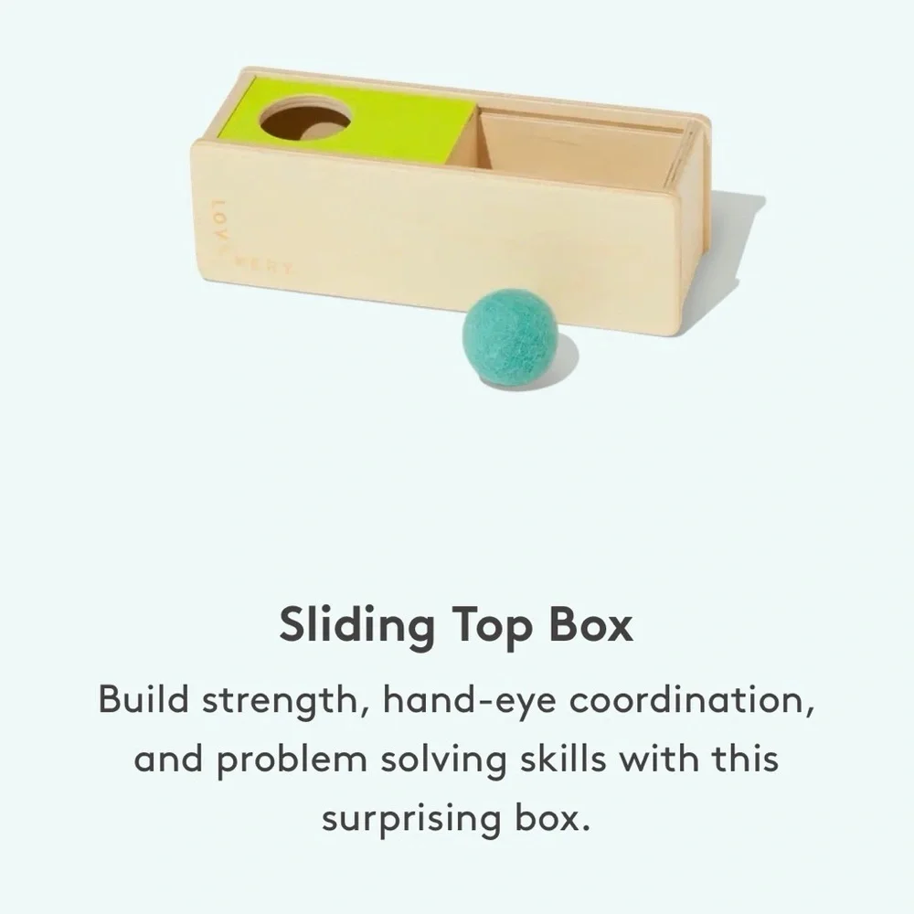 Lovevery Sliding Top Box with Plastic Rattle Ball from the Thinker Play Kit